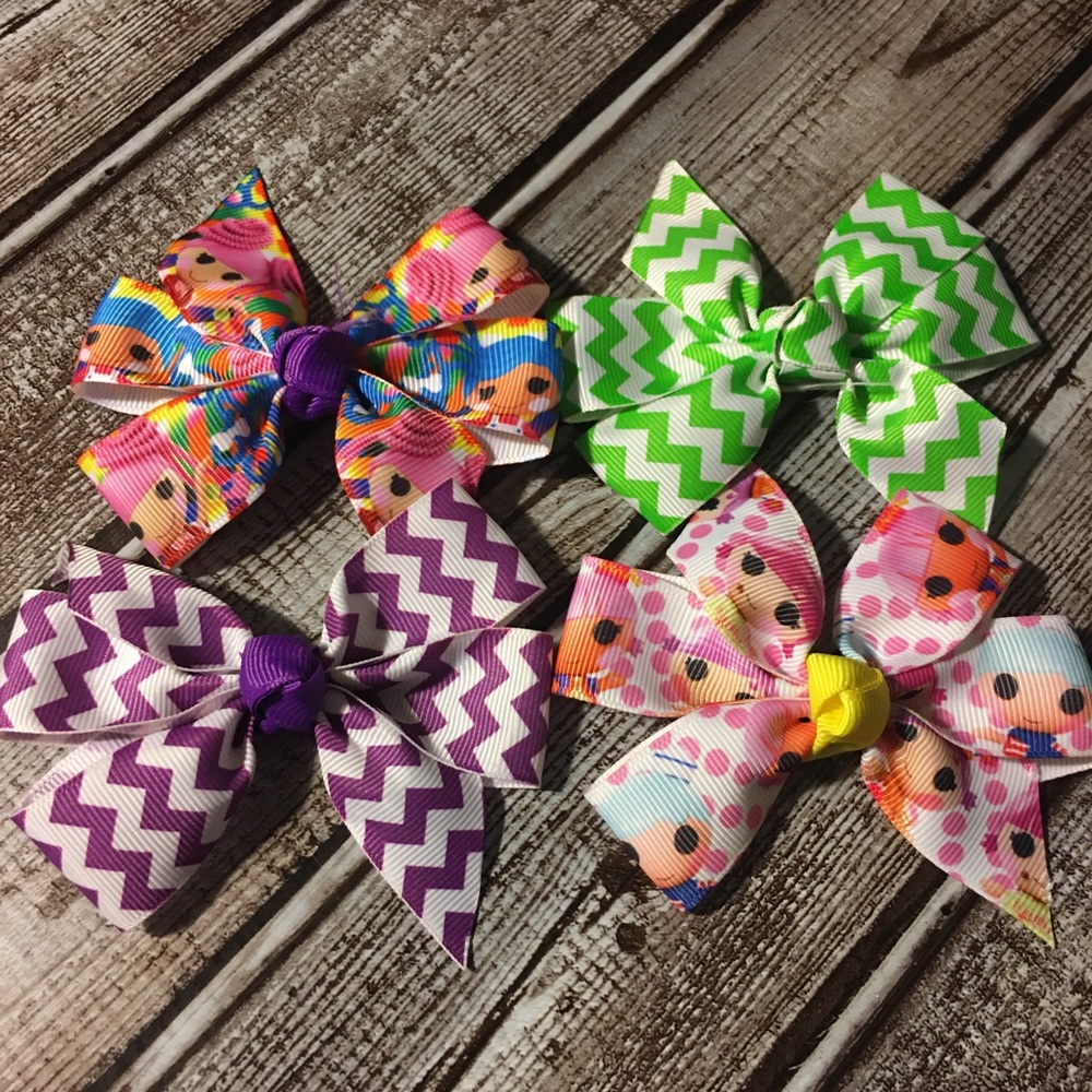 Buy 2 sets/3rd set FREE... 4pc Lala Loopsy bows